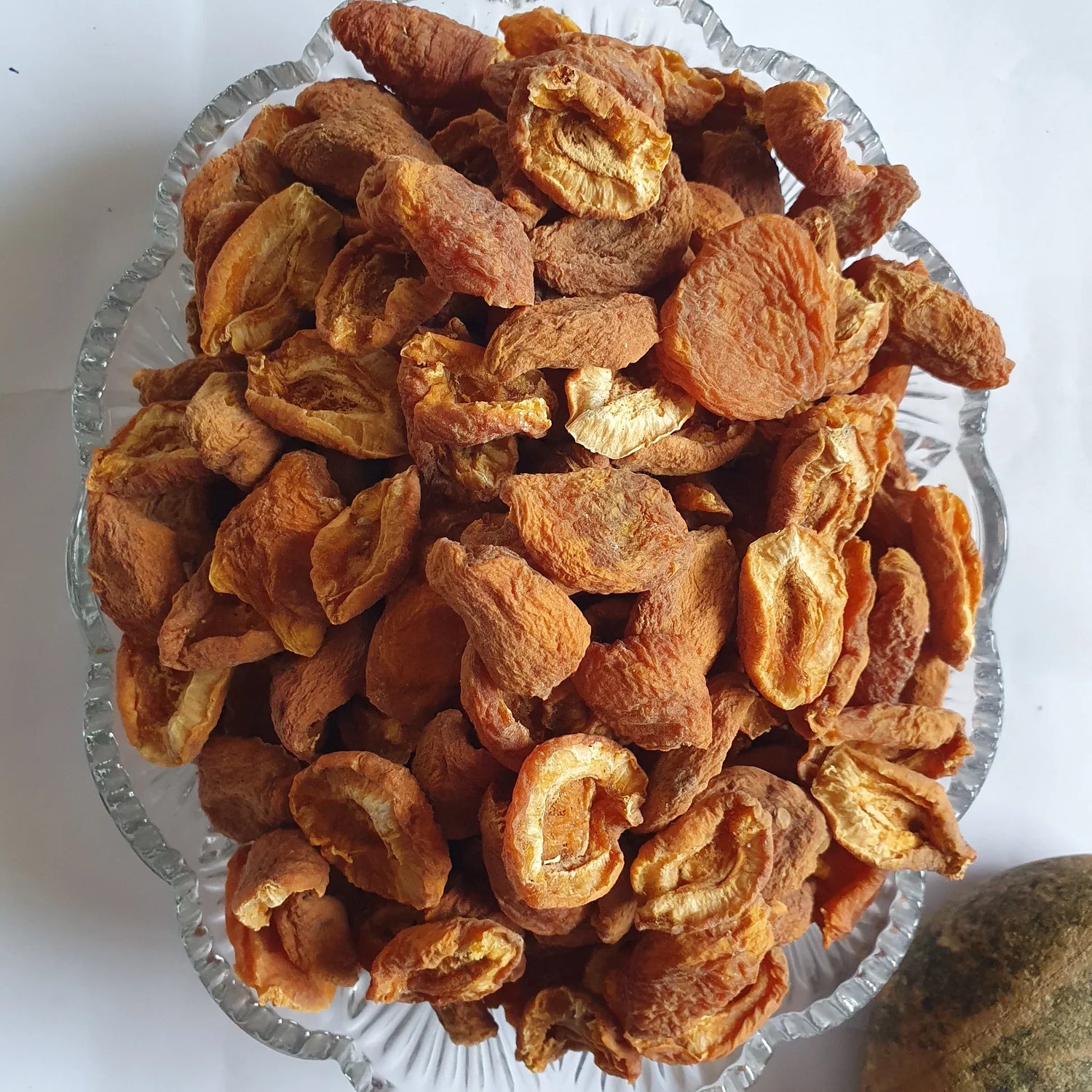 sun dried apricot in a glass tray